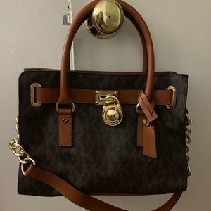 Brown and gold Michael Kors hand bag